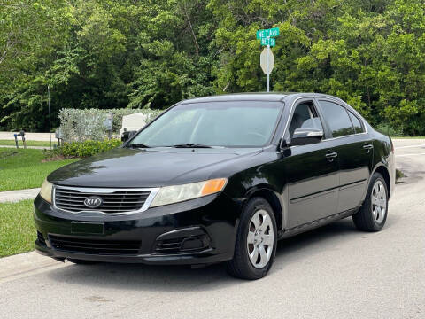 2009 Kia Optima for sale at L G AUTO SALES in Boynton Beach FL