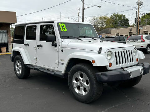 Pre-Owned 2013 Jeep Wrangler Unlimited Sahara Sport Utility in Afton  #UET1401A