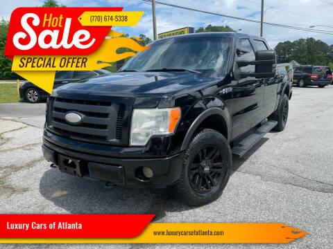 2009 Ford F-150 for sale at Luxury Cars of Atlanta in Snellville GA