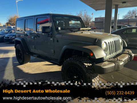 2014 Jeep Wrangler Unlimited for sale at High Desert Auto Wholesale in Albuquerque NM