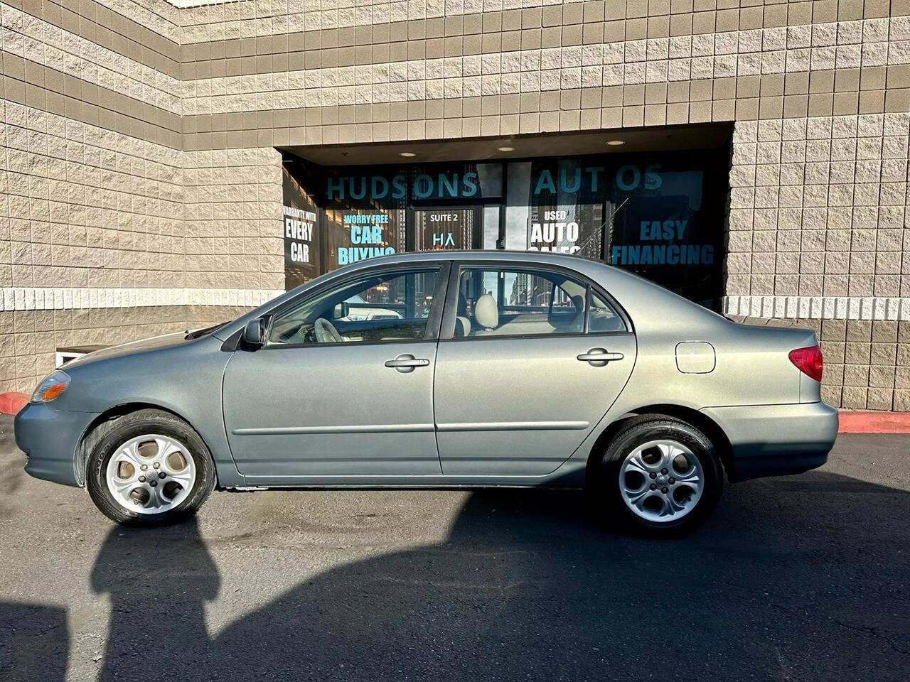 2003 Toyota Corolla for sale at HUDSONS AUTOS in Gilbert, AZ