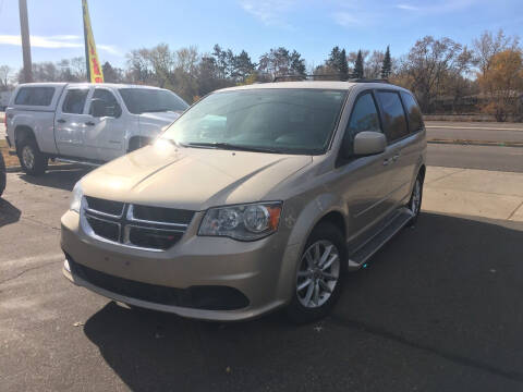 2014 Dodge Grand Caravan for sale at Premier Motors LLC in Crystal MN