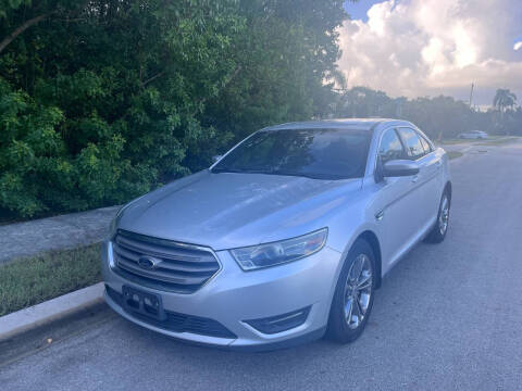 2013 Ford Taurus for sale at L G AUTO SALES in Boynton Beach FL