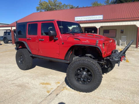 2009 Jeep Wrangler Unlimited for sale at PITTMAN MOTOR CO in Lindale TX