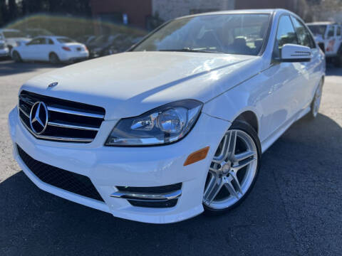 2014 Mercedes-Benz C-Class for sale at Atlanta Unique Auto Sales in Norcross GA