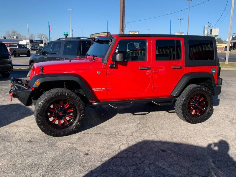 2012 Jeep Wrangler Unlimited for sale at Superior Used Cars LLC in Claremore OK