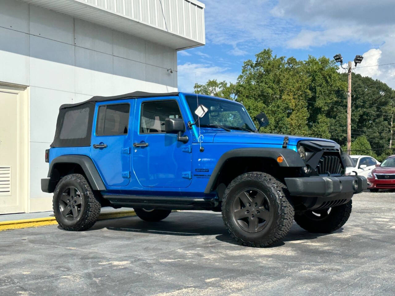 2015 Jeep Wrangler Unlimited for sale at Prompt Luxury Cars LLC in Austell, GA