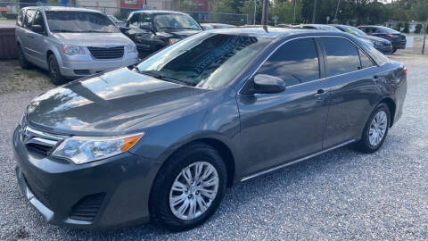 2013 Toyota Camry for sale at Velocity Autos in Winter Park FL