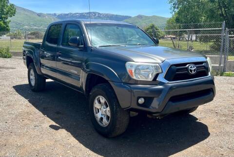 2013 Toyota Tacoma for sale at The Car-Mart in Bountiful UT