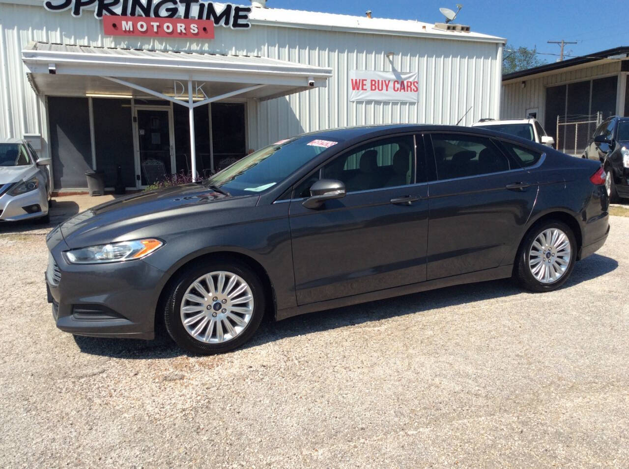 2016 Ford Fusion Hybrid for sale at SPRINGTIME MOTORS in Huntsville, TX