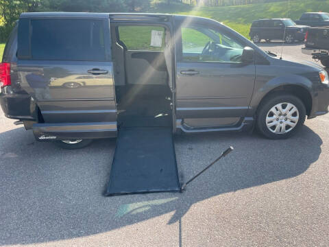 2017 Dodge Grand Caravan for sale at Hartley Auto Sales & Service in Milton VT