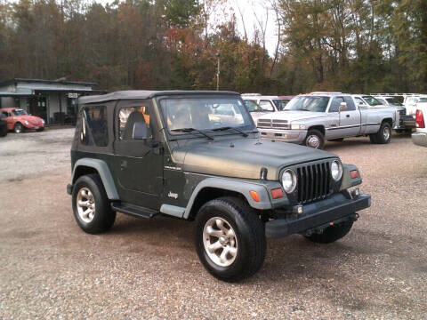 1997 Jeep Wrangler for sale at Tom Boyd Motors in Texarkana TX