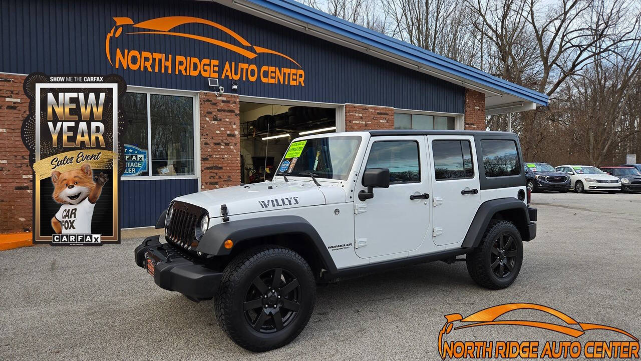 2017 Jeep Wrangler Unlimited for sale at North Ridge Auto Center LLC in Madison, OH