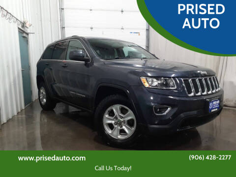 2014 Jeep Grand Cherokee for sale at PRISED AUTO in Gladstone MI