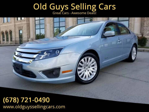 2011 Ford Fusion Hybrid for sale at Empire Auto Group in Cartersville GA