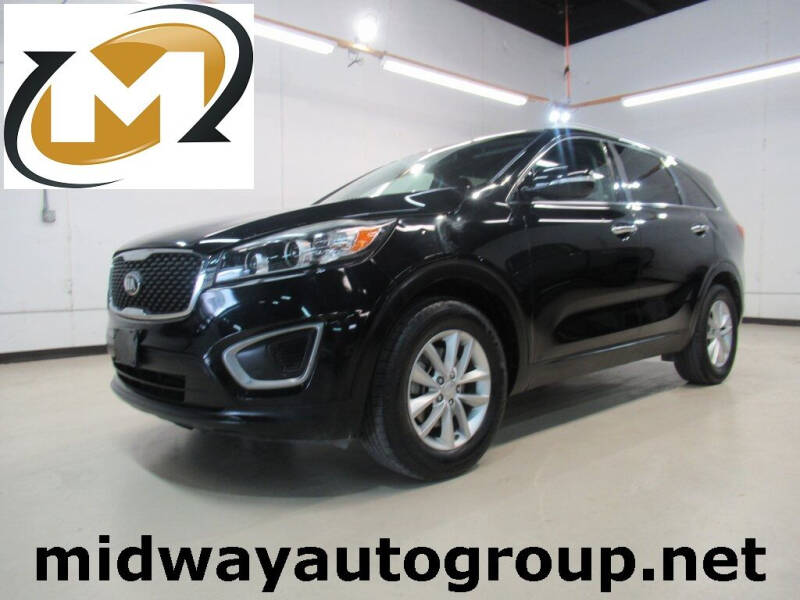 2016 Kia Sorento for sale at Midway Auto Group in Addison TX