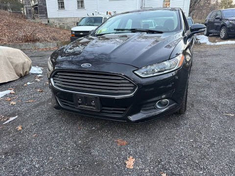 2014 Ford Fusion for sale at MCQ Auto Sales in Upton MA