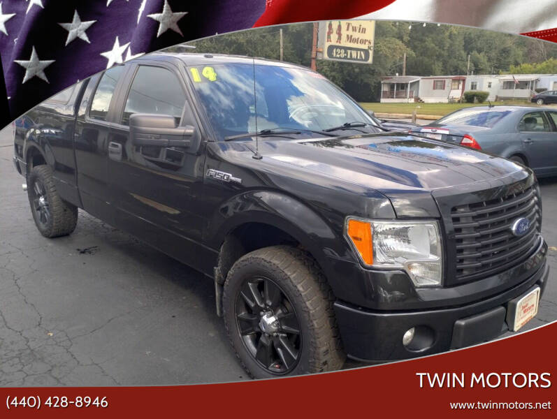 2014 Ford F-150 for sale at TWIN MOTORS in Madison OH