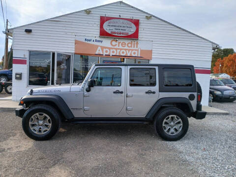 2015 Jeep Wrangler Unlimited for sale at MARION TENNANT PREOWNED AUTOS in Parkersburg WV