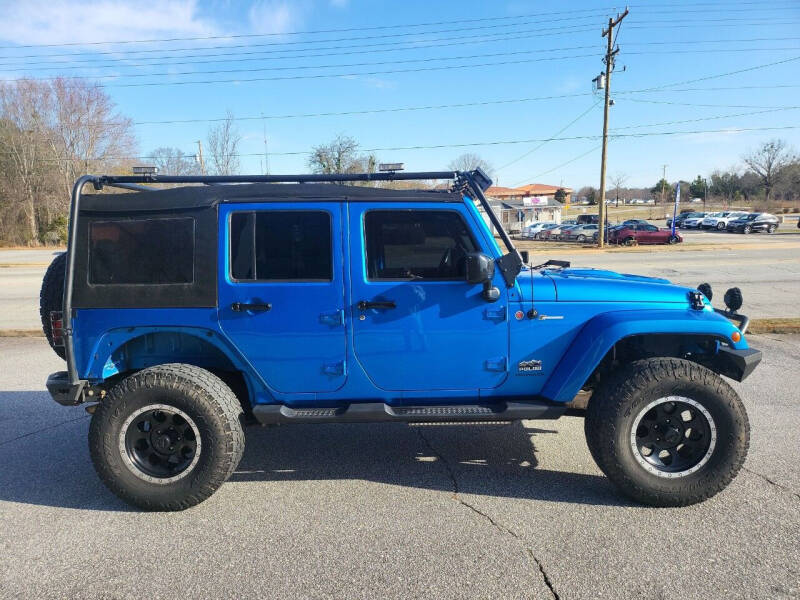 2014 Jeep Wrangler Unlimited for sale at One Stop Auto Group in Anderson SC