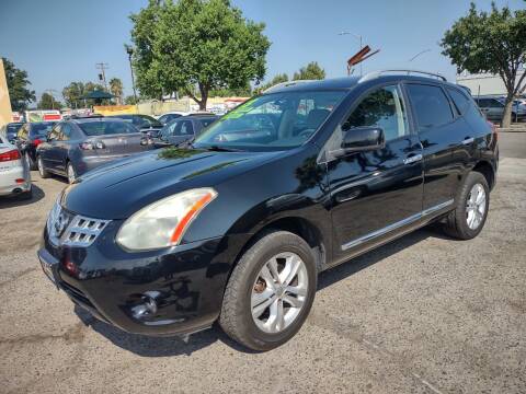 2013 Nissan Rogue for sale at Larry's Auto Sales Inc. in Fresno CA