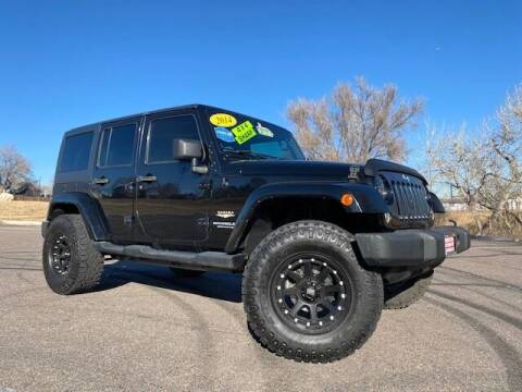 2014 Jeep Wrangler Unlimited for sale at UNITED Automotive in Denver CO