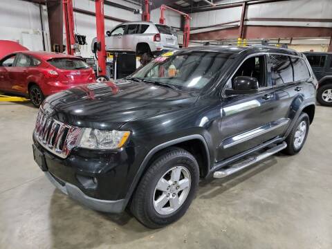 2012 Jeep Grand Cherokee for sale at Hometown Automotive Service & Sales in Holliston MA