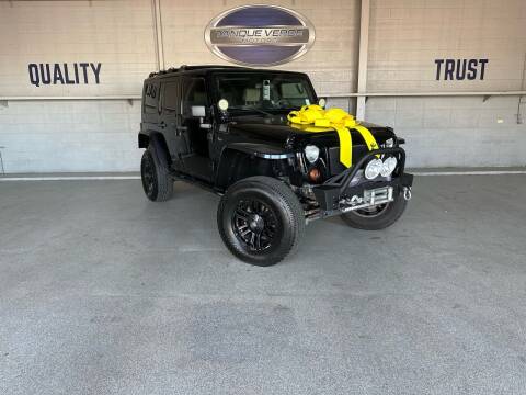 2010 Jeep Wrangler Unlimited for sale at TANQUE VERDE MOTORS in Tucson AZ