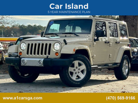 2011 Jeep Wrangler Unlimited for sale at Car Island in Duluth GA