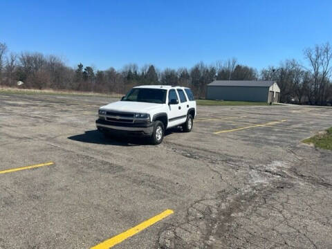2005 Chevrolet Tahoe for sale at Caruzin Motors in Flint MI