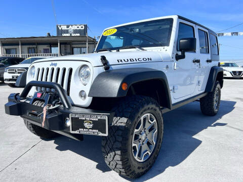 2017 Jeep Wrangler Unlimited for sale at Velascos Used Car Sales in Hermiston OR