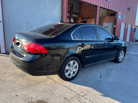 2009 Kia Optima for sale at Trevino's Auto Sales in San Antonio TX