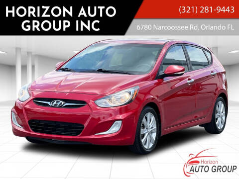 2013 Hyundai Accent for sale at HORIZON AUTO GROUP INC in Orlando FL