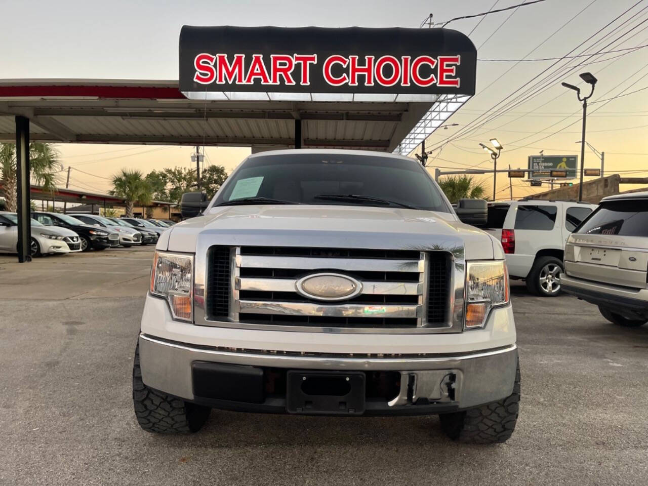 2009 Ford F-150 for sale at SMART CHOICE AUTO in Pasadena, TX