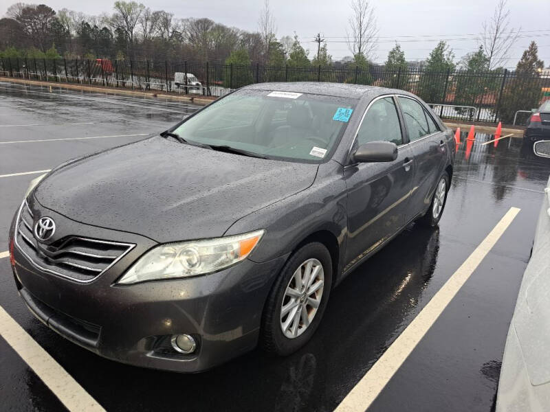 2010 Toyota Camry for sale at Magwood Auto Dealers LLC in Jonesboro GA