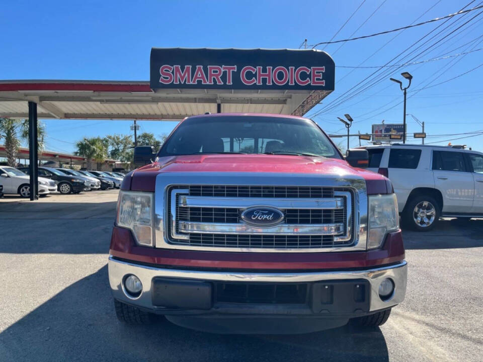 2014 Ford F-150 for sale at SMART CHOICE AUTO in Pasadena, TX