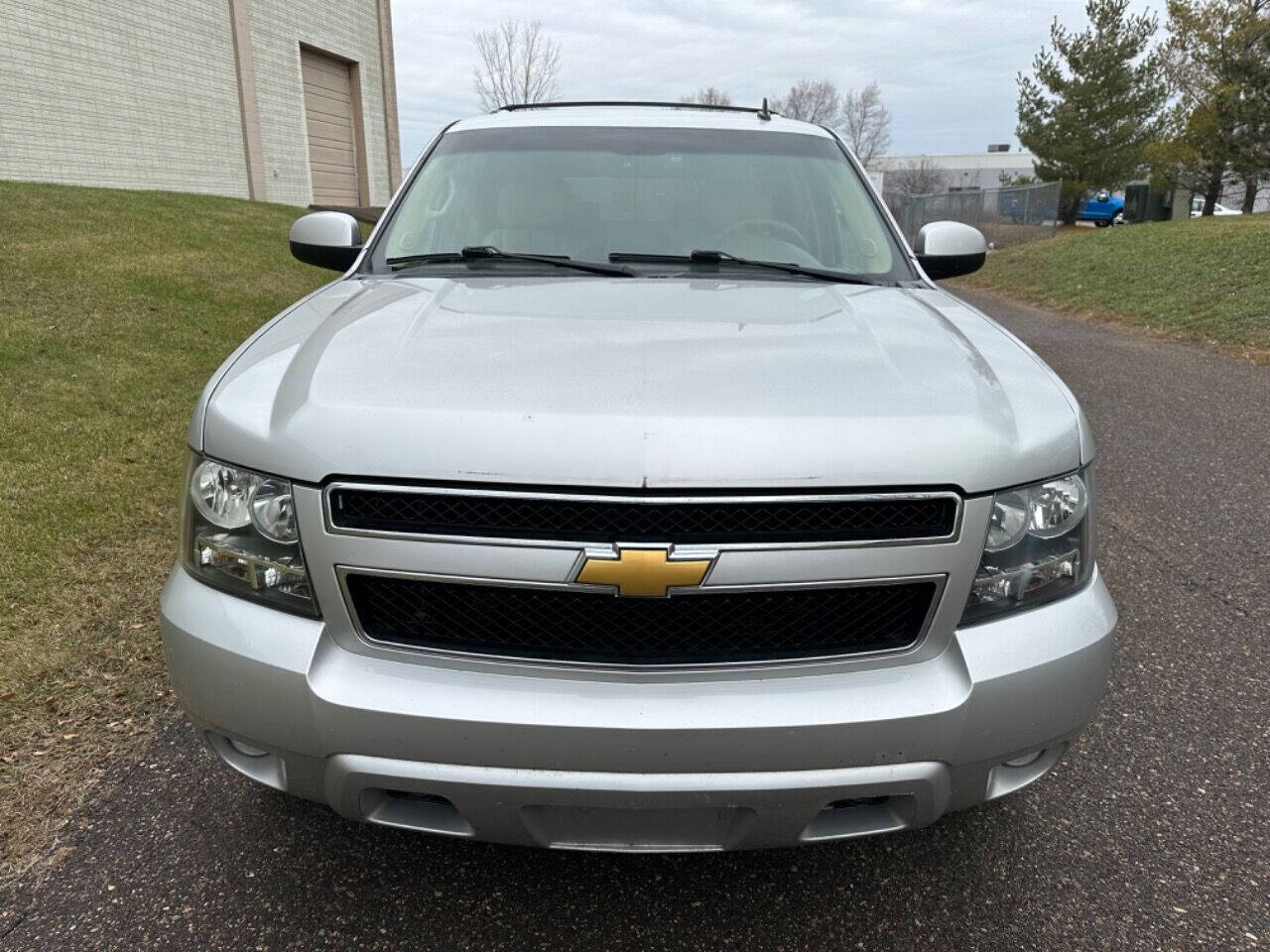 2011 Chevrolet Suburban for sale at JUST AUTOS in MINNEAPOLIS, MN