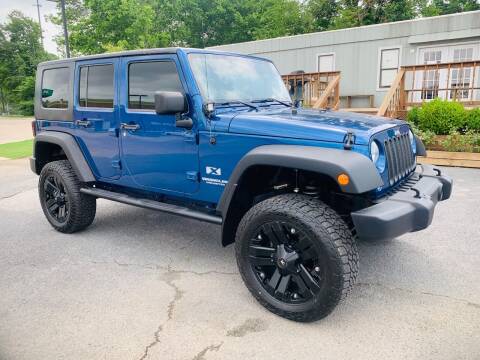 2009 Jeep Wrangler Unlimited for sale at BRYANT AUTO SALES in Bryant AR