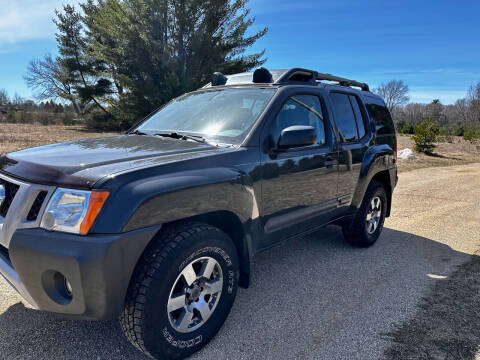 2012 Nissan Xterra for sale at Hammer Auto LLC in Stanwood MI