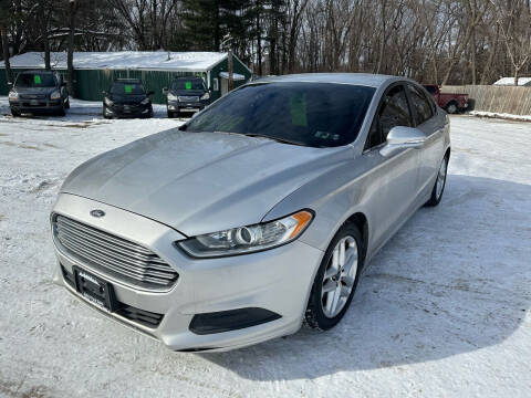 2016 Ford Fusion for sale at Northwoods Auto & Truck Sales in Machesney Park IL