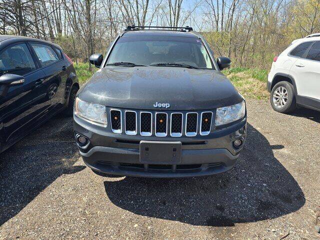Used 2011 Jeep Compass Sport with VIN 1J4NT4FB5BD136983 for sale in Grand Ledge, MI