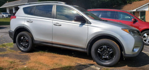 2013 Toyota RAV4 for sale at Boss Up Auto / Calavan Chrysler Jeep Ram Dodge in Lithia Springs GA