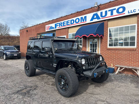 2014 Jeep Wrangler Unlimited for sale at FREEDOM AUTO LLC in Wilkesboro NC
