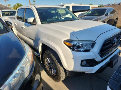 2017 Toyota Tacoma for sale at Shamrock Group LLC #1 - SUV / Trucks in Pleasant Grove UT