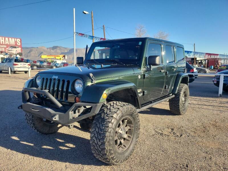 2011 Jeep Wrangler Unlimited for sale at Bickham Used Cars in Alamogordo NM