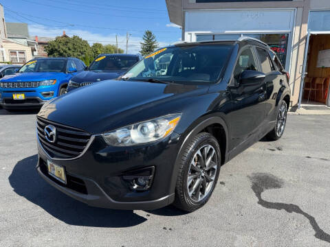 2016 Mazda CX-5 for sale at ADAM AUTO AGENCY in Rensselaer NY