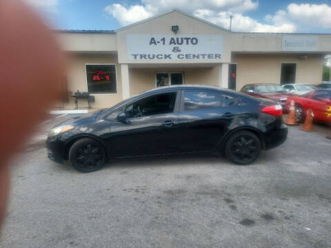 2015 Kia Forte for sale at A-1 AUTO AND TRUCK CENTER in Memphis TN