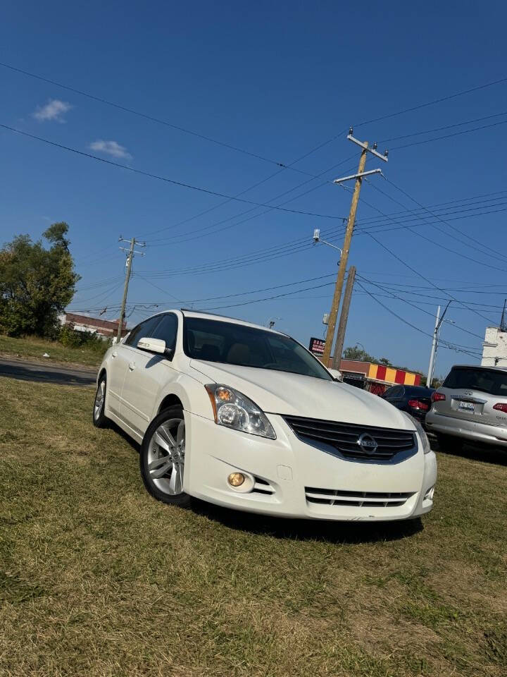 2012 Nissan Altima for sale at H & H AUTO GROUP in Detroit, MI