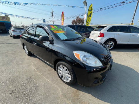 2014 Nissan Versa for sale at ROMO'S AUTO SALES in Los Angeles CA
