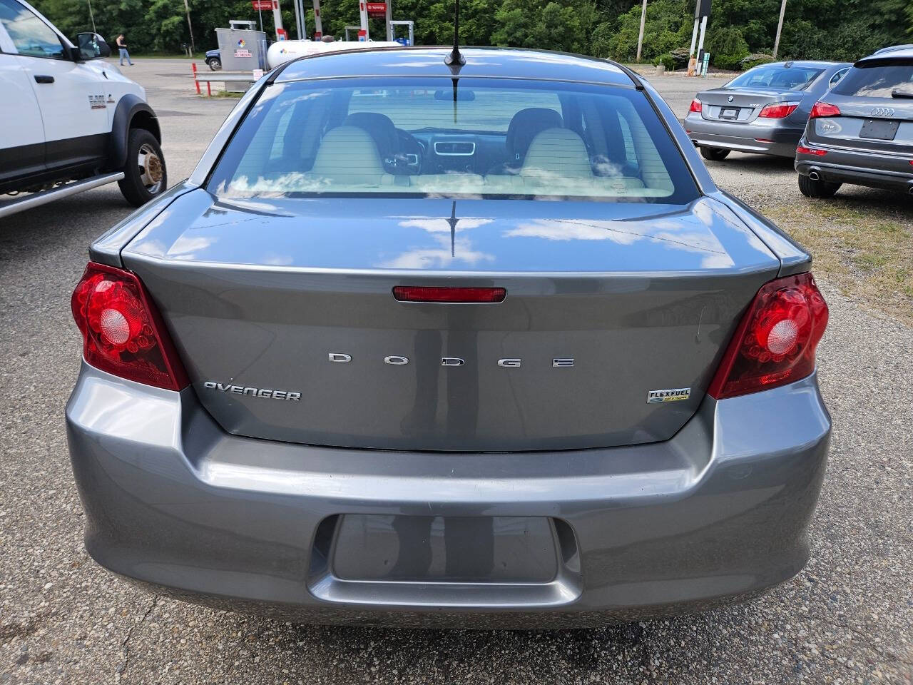 2013 Dodge Avenger for sale at DANGO AUTO SALES in HOWARD CITY, MI